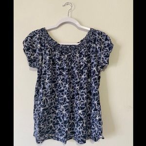 White and blue floral blouse